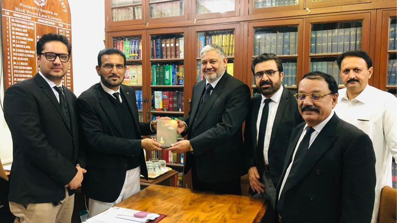 Sindh High Court Bar Association at Karachi gifting a book on my visit to library of the Bar.